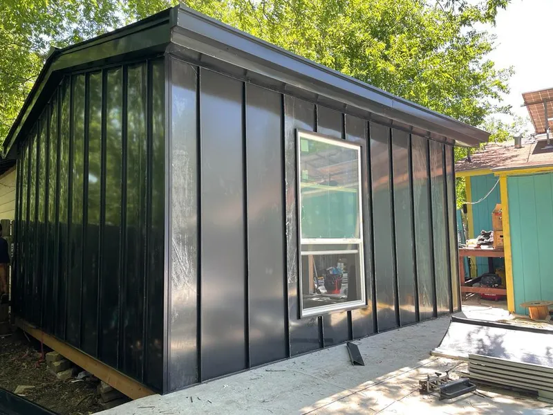 Black standing seam metal wall panels for Metal Roof Installation in Lamar