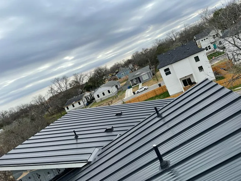Standing seam metal roof panels with vents for Skylight Repair in Lamar
